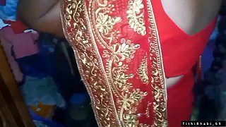Desi Bhabi Changing Her Red Shari.