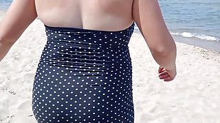 Flashing my big tits at public beach