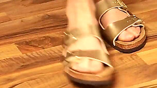 Gold Sandals Dangling Tease - Bare Soles in Focus