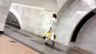 Upskirt without panties. Blonde in long white skirt.