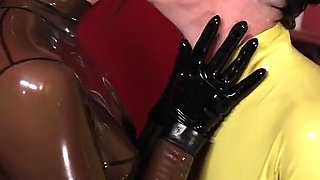 Rubber Queens Make Out on the Bed