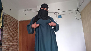 Shy Muslim Girl Taking off Burqa Slowly