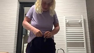 Hot MILF secretly fingers herself with bottle and squirts hard in public toilet