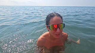 chatting on the beach among the voyeurs