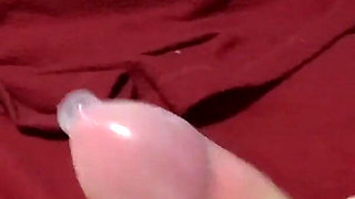 She jerks me off with a condom and I cum inside