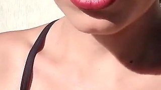 Smoking with Her Breasts Out