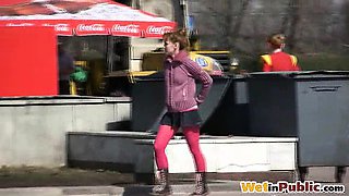 Amateur gal wets pink tights and panties