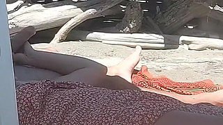 Public Handjob! Teacher Gives Her Student a Handjob on a Nude Beach!