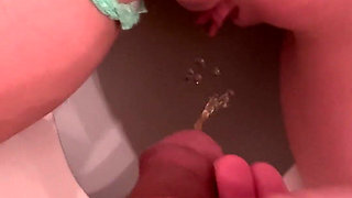 Piss on Her Pussy Lips While Shes Also Peeing on the Toilet