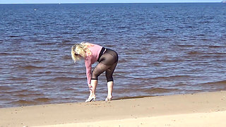 Funny MILF with Nylon Ass and Tits on Beach