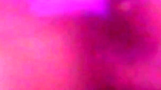Young Girl Using Her Feet to Play with the Dildo While Masturbating