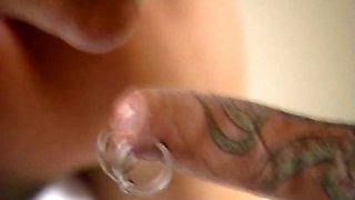 Pierced and tattooed dick sucked off