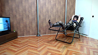 A Woman Is Restrained and Teased with Erotic Lotion