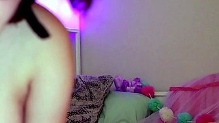 Small titted brunette teen fingering on the bed
