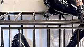Anal Stretching a Caged Gimp