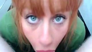 Redhead milf deepthroats  behind counter of Shop