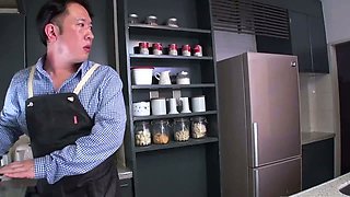 Japanese housewife sucks a plumber's fat dick in the kitchen