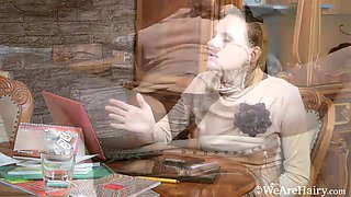 Pique Dame masturbates at her wooden table - WeAreHairy