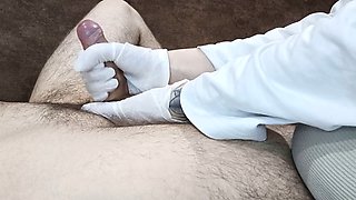 Amateur couple Maryhott gives a medical-themed handjob in gloves