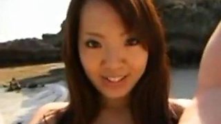 Hitomi Tanaka on the beach