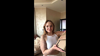 A cutie in sexy lingerie gets turned on by reading