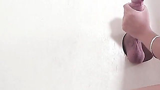 Brunette in Hot Blowjob, Footjob and Facial Cushot in the Gloryhole!