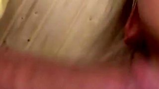 Blonde chick gets two cocks to suck and gets mouth filled with cum