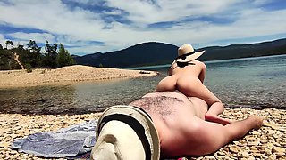 Naughty couple fucked on a public nude beach