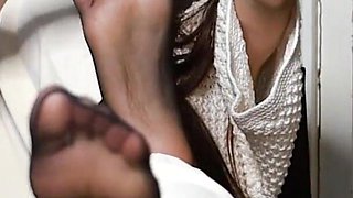 Shy Secretary Kerry Displays Her Nylon Feet on the Table