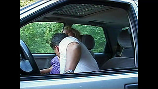 Busty MILF Gets Fucked on the Hood of the Car by a Big Cock That Cums in Her Mouth