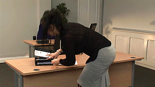 Secretary answers the phone while stud creams her face