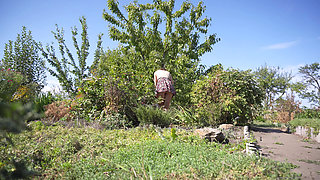 Watching Hot Neighbor Working in Garden