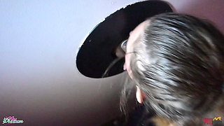 Girlfriend Sucks Condom off Stranger at Glory Hole