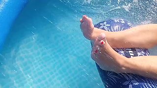 She loves to tease me with her feet in the pool