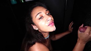 Emori Pleezer gets a load on her face through a glory hole