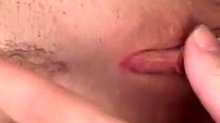 Two Hot Chicks Play with Their Pussies on the Sofa