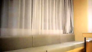 Cute amateur asian web cam girl playing with her toy