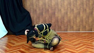 Escape from cross-legged orgasmic bondage with a vibrator