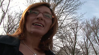 Brunette German slut rubs her pierced pussy in solo action