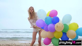 Italian mature blond plays with balloons