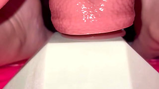 Tiny redhead rides a fence post cock