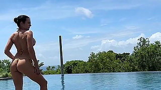 Teasing at the Pool in Micro Bikini, Swimming
