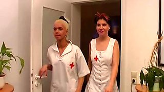 Two hot German nurses pleasing two loaded cocks in the office