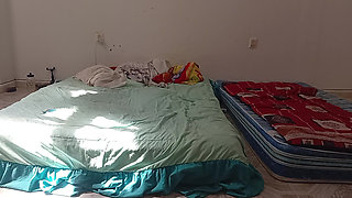Mexican mother-in-law cleaning guest room in thong
