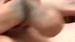 Brunette plays with dildo