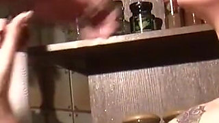 Tattooed couple pussy fucking in the kitchen