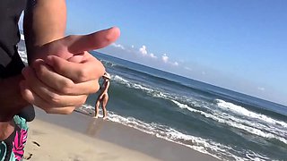 Two horny sluts sucking cock on the beach under the sound of the sea breeze