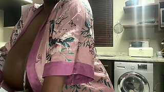 Ebony MILF Moaning and Stripteasing in Kitchen