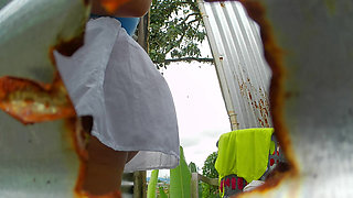 RECORDED IN AN OUTDOOR BOOTH TALKING ON A CELL PHONE