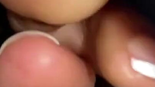 Ebony Girl Under Her Covers in Bed Show off Feet